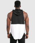 Back view of Men’s sleeveless hoodie, black on top and white on the bottom wide arm openings, and a long scoop design.
